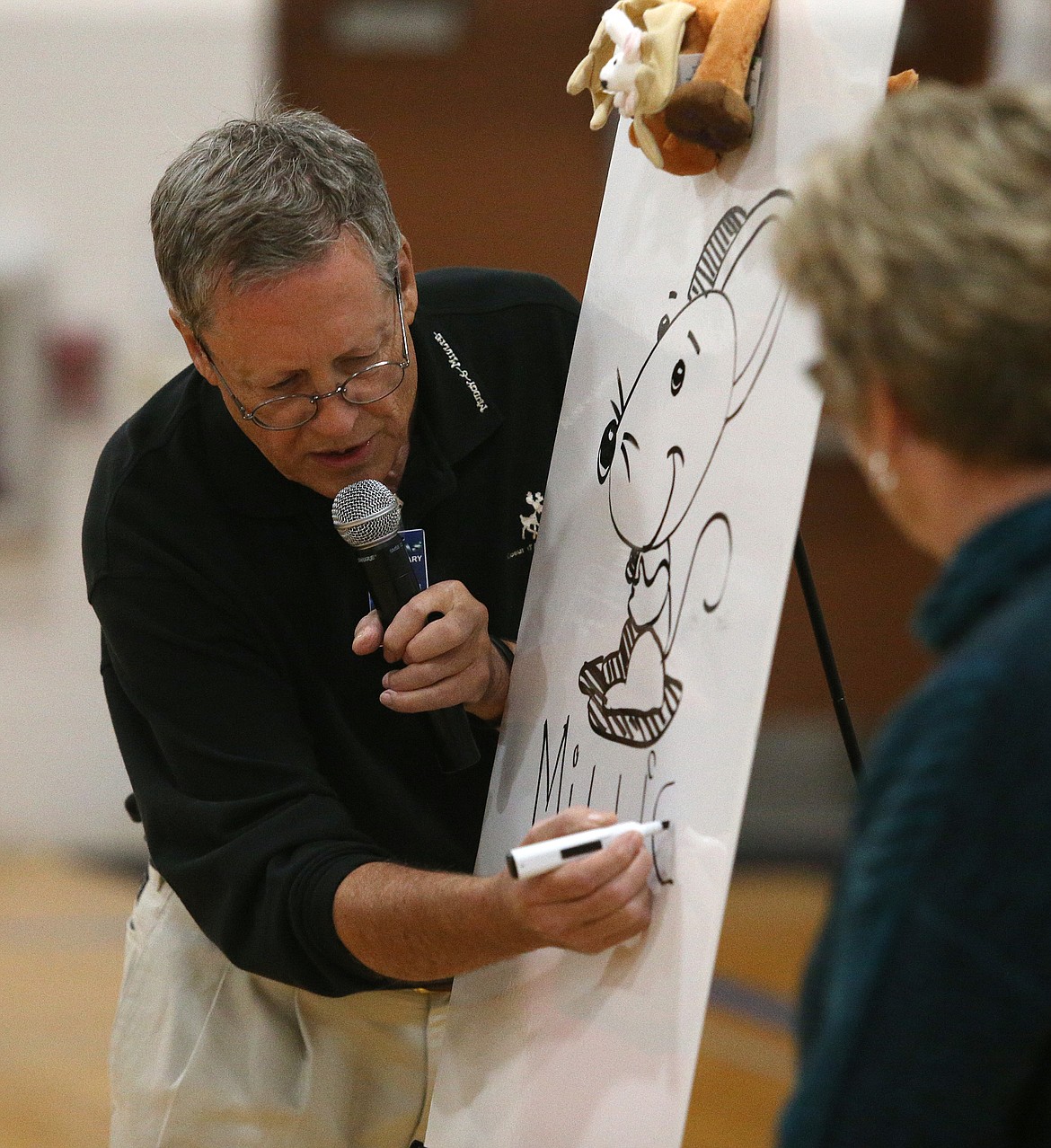 LOREN BENOIT/Press
Illustrator Charles Reasoner draws Millie Mouse during his visit Tuesday to Atlas Elementary School.