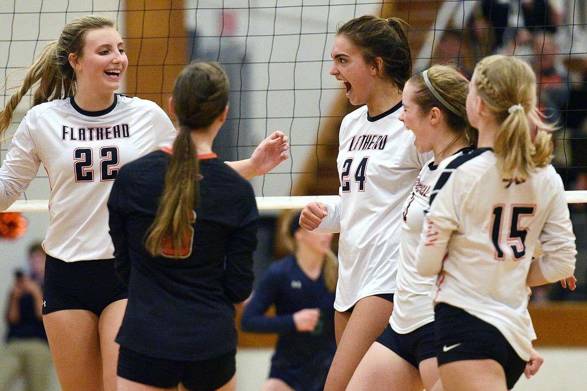 Flathead celebrates a point in their second match with Glacier during crosstown volleyball at Flathead High School on Thursday. (Casey Kreider/Daily Inter Lake)