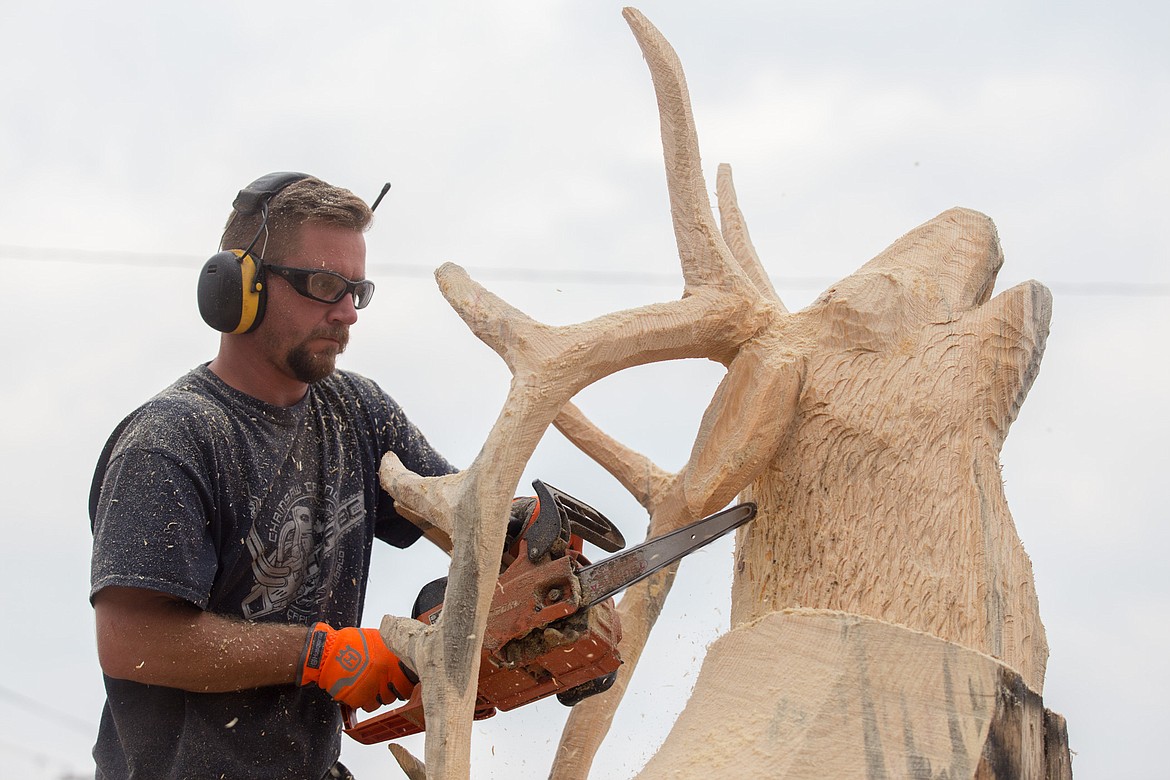 Jacob Lucas competes in the Kootenai Country Montana Chainsaw Carving Championship in Libby in 2017. (John Blodgett/The Western News file photo)