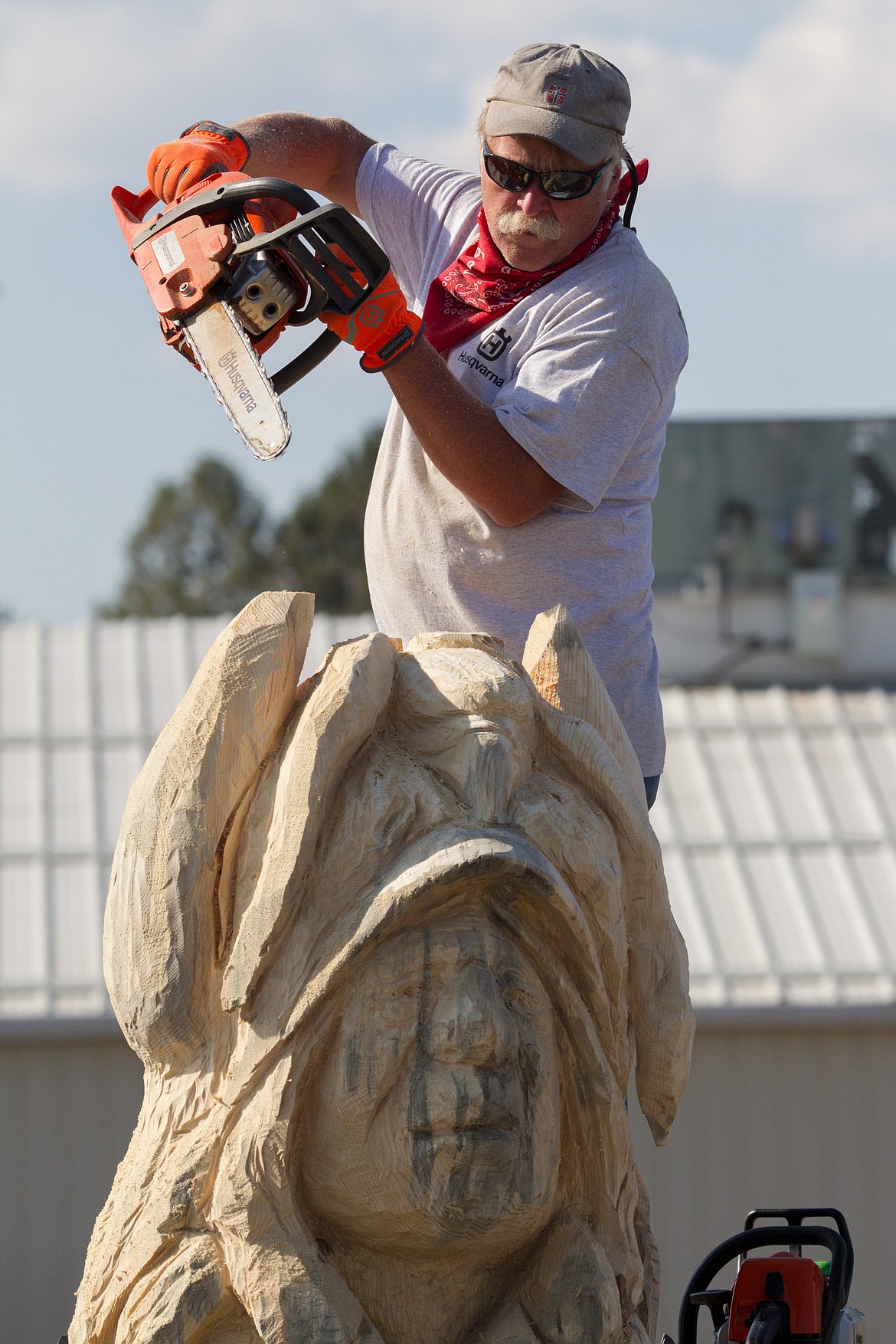 Ron Adamson of Libby competes the Kootenai Country Montana Chainsaw Carving Championship in Libby in 2017. (John Blodgett/The Western News file photo)