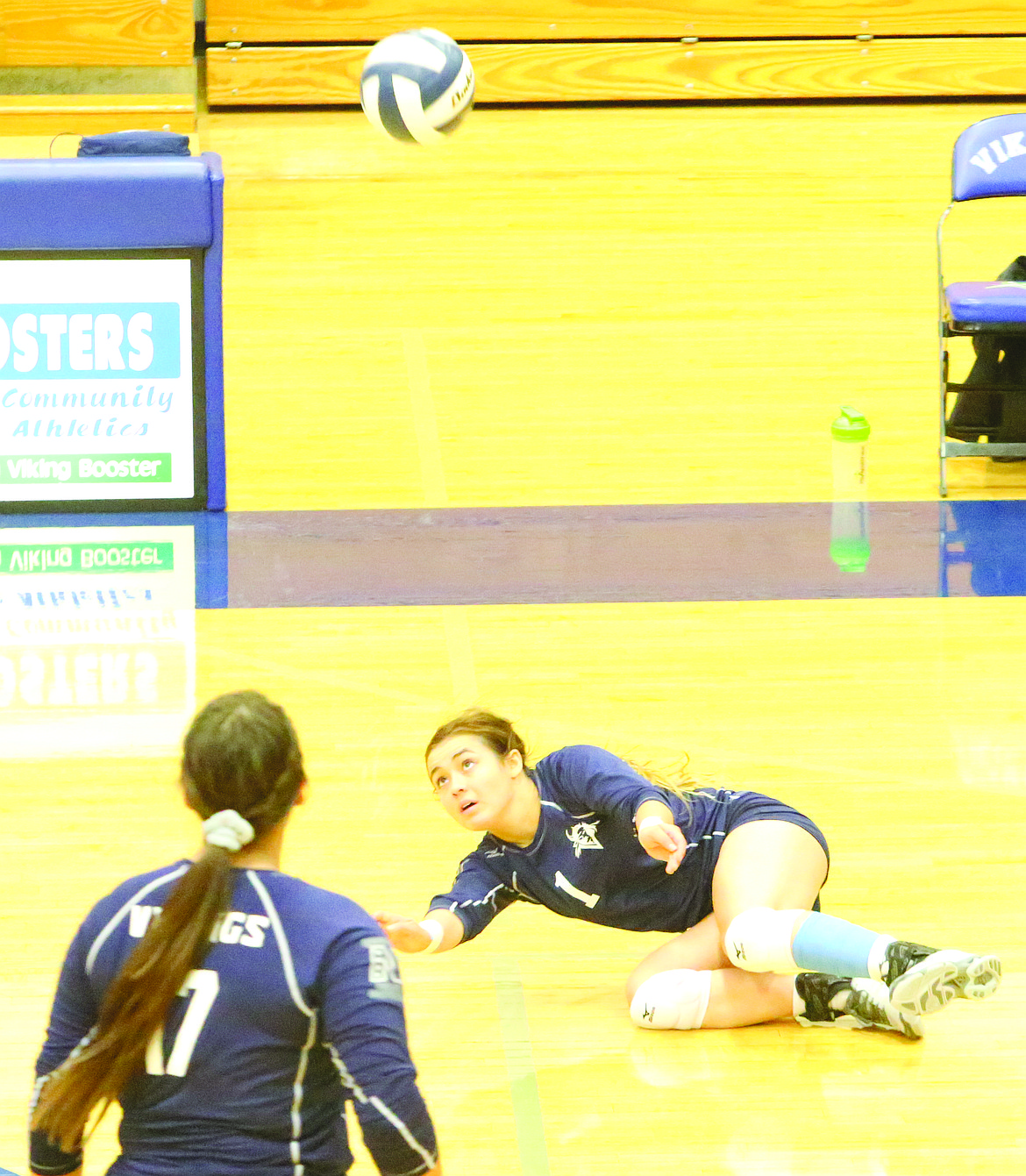 Connor Vanderweyst/Columbia Basin Herald
Big Bend sophomore Hailey Miller dives to keep the ball alive against Spokane.