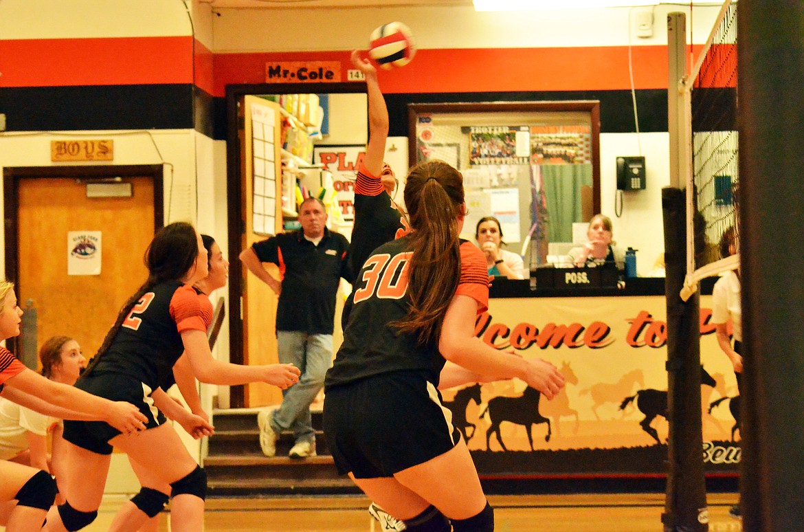 Trotter Cree Lulack gets control over the ball to hit it back across the net with her team ready to back up for a continued rally. (Erin Jusseaume/ Clark Fork Valley Press)