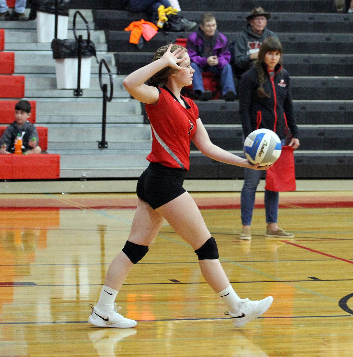 Photos by Josh McDonald
Wallace libero Kali Davis prepares to serve the ball during Wallace&#146;s recent match with Kootenai. 
Hayley Oertli sets the ball up for one of her hitters during the second set of the Miners&#146; North Star League win over Kootenai.