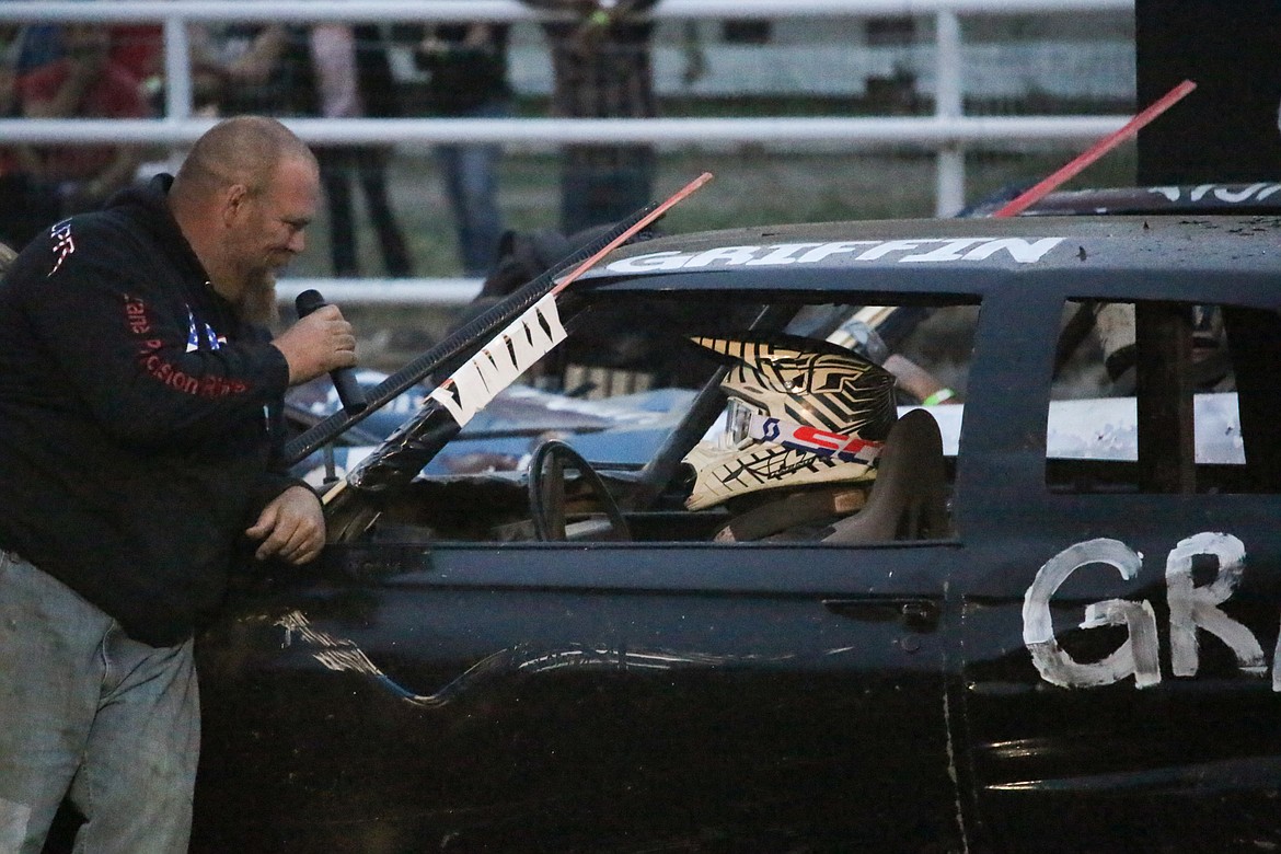 Photo by MANDI BATEMAN
Kyle Watts talks with Griffin Falck while waiting for competitors to enter the arena.