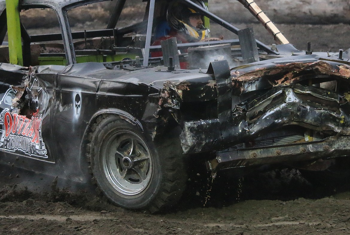 Photo by MANDI BATEMAN
Driving hard during the demolition derby.