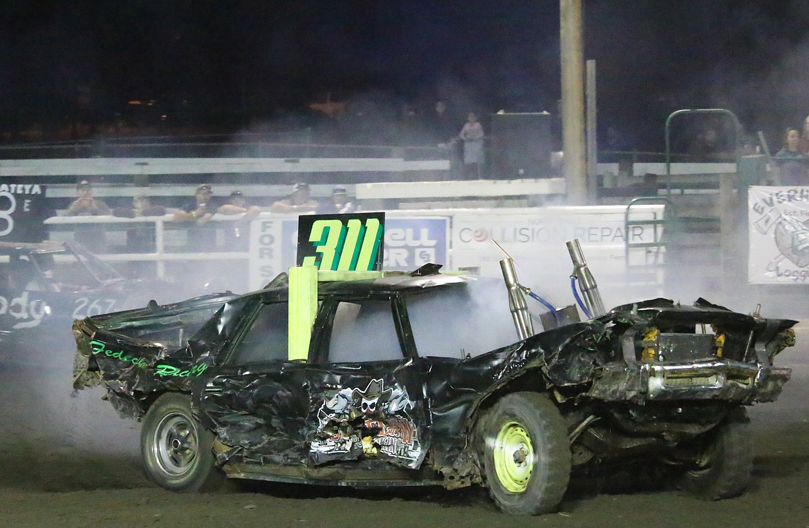 Photo by MANDI BATEMAN
Derek Fedechko battles smoke and a raised front end to take third place at the 2018 Smash &amp; Bash.