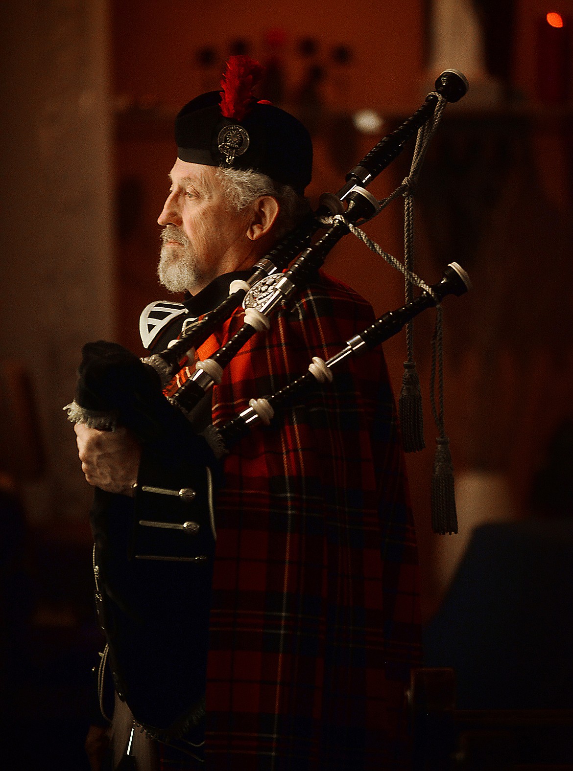 Portrait of Doyle Carr, of The Montana Highlanders Association Bagpipe Band, on Thursday, March 15, at St. Matthew&#146;s Catholic Church in Kalispell. 
(Brenda Ahearn/Daily Inter Lake)