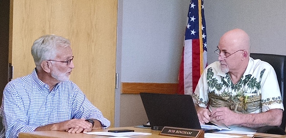 Steve Meyer, left, a partner with Parkwood Business Properties, discusses Kootenai County&#146;s downtown campus, with Commissioner Bob Bingham on Monday. (BRIAN WALKER/Press)