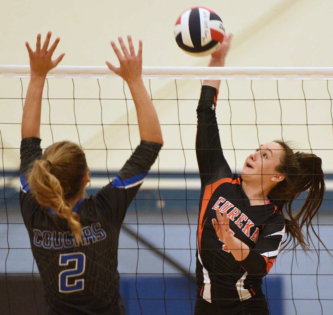 Eureka&#146;s Sienna Utter (4) looks for a kill at the net against Stillwater Christian&#146;s Ramey Metzger (2) on Tuesday. (Casey Kreider/Daily Inter Lake)