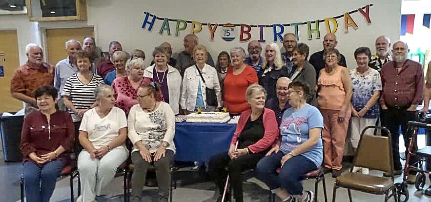 Members of the Libby High School class of 1961 celebrated their 75th birthdays together at VFW Post 1548 on Saturday. The classmates traveled from as far as Georgia to attend the joint birthday party. Back: George Wood, Bob Beagle, Tom DeShazer, Merly Schultz JoAnnette (Wilson) Riggs, Chuck Resch, Dick Kessel, Pauline (Jones) Schroader, Don Brown, Jim Hamilton, Dan Rice, John Beebe and Meldon Peterson. Middle: Bonnie (Leir) Swenson, Charlene (Byrer) Alexander, Shirline (Jones) Almeida, Sheryl (Fuhlendorf) Vinson, Sharon (Campbell) Gosline, Sharelle (Hayden) Gehring, Marie (Kujawa) McAlear, Dorothy (Rose) Sharp, Ida (Wilson) Fisher and Eileen (Klumpp) Dollan. Front: Vernelle (Hansen) Tiwater, Kathy (Rambo) Bache, Marjorie (Barney) Robinson, Paul Seifert, Kathy (Scow) Newcomb. (Courtesy photo)