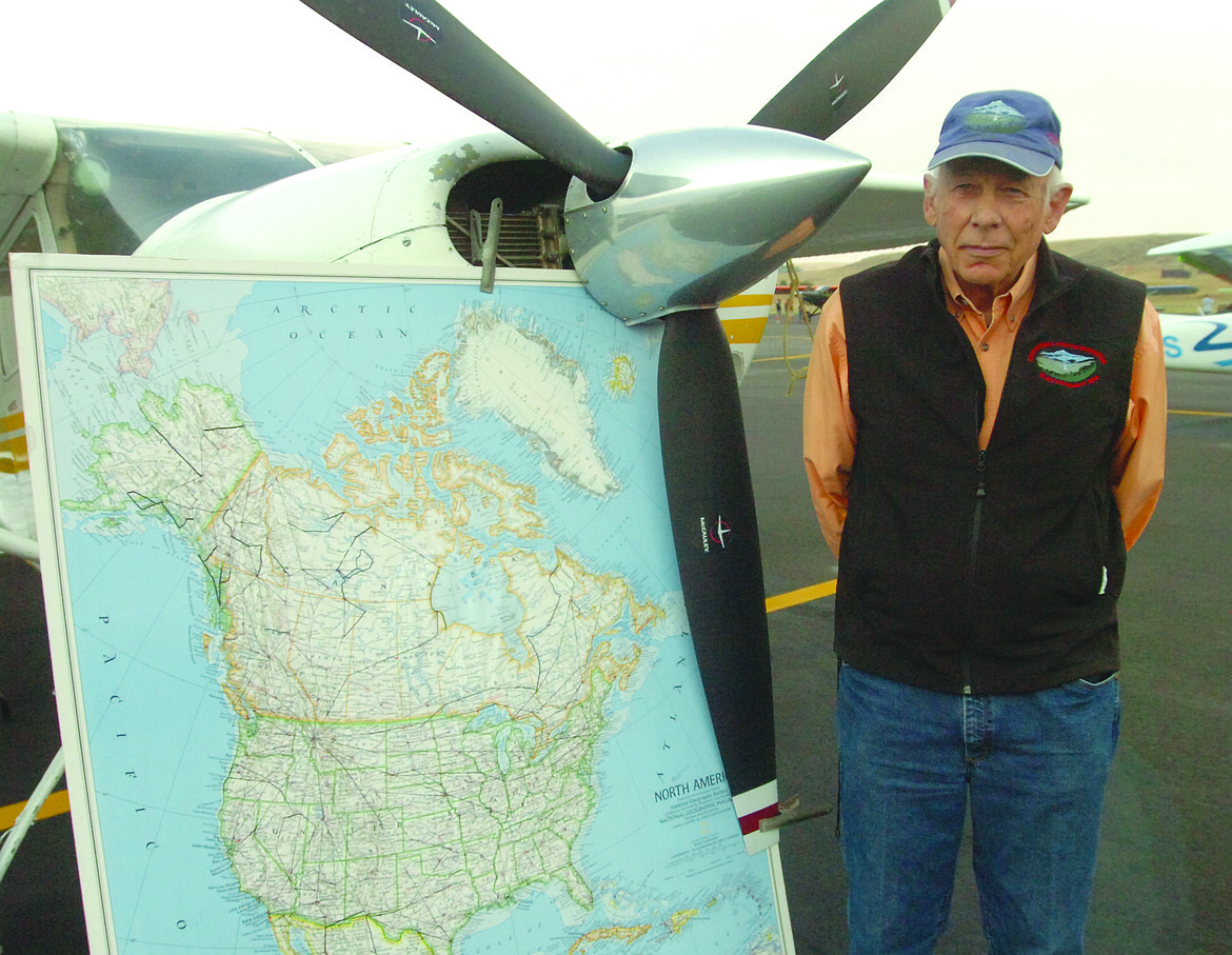 Chuck Jarecki of Polson has a story to tell about his air miles. He&#146;s shown with a North America map on which is drawn the routes he&#146;s flown in the 1976 Cessna 180 behind it. Jarecki has logged more than 5,000 miles and has also landed in every Central America country except Nicaragua. (Photos by Joe Sova/Lake County Leader)