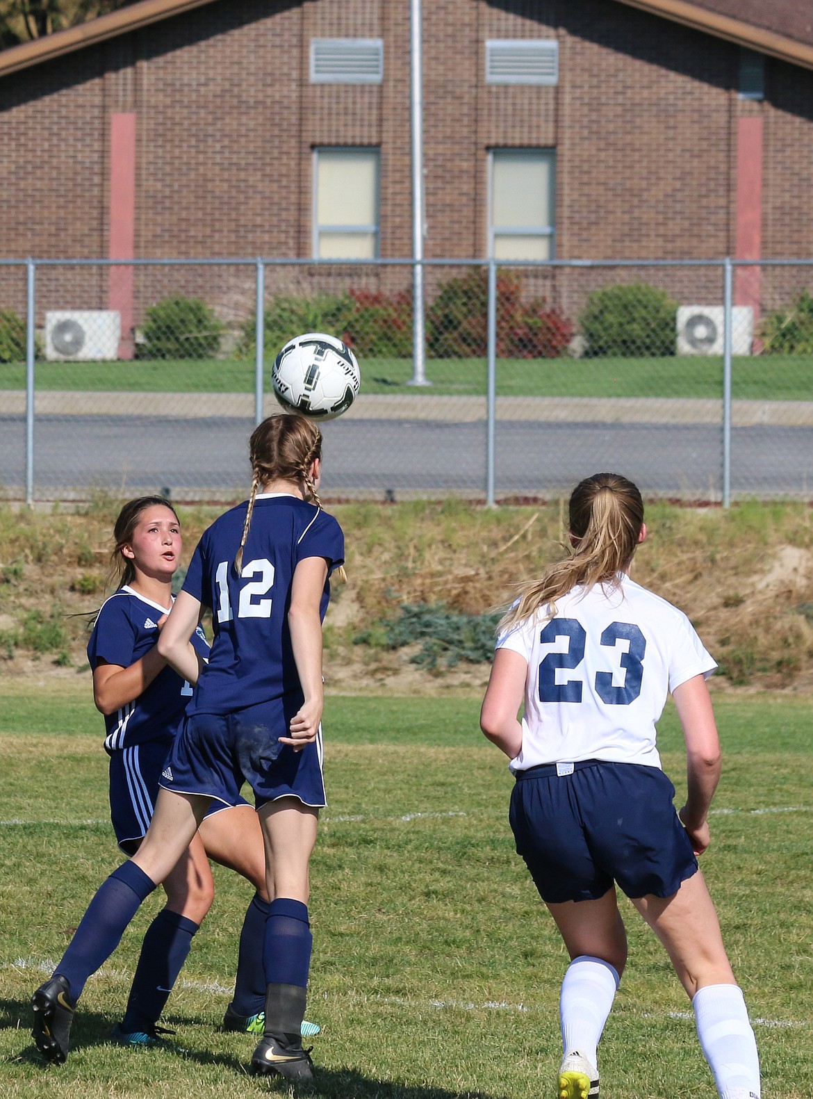 Photo by MANDI BATEMAN
Emma Pinkerton uses her head for more than just thinking.