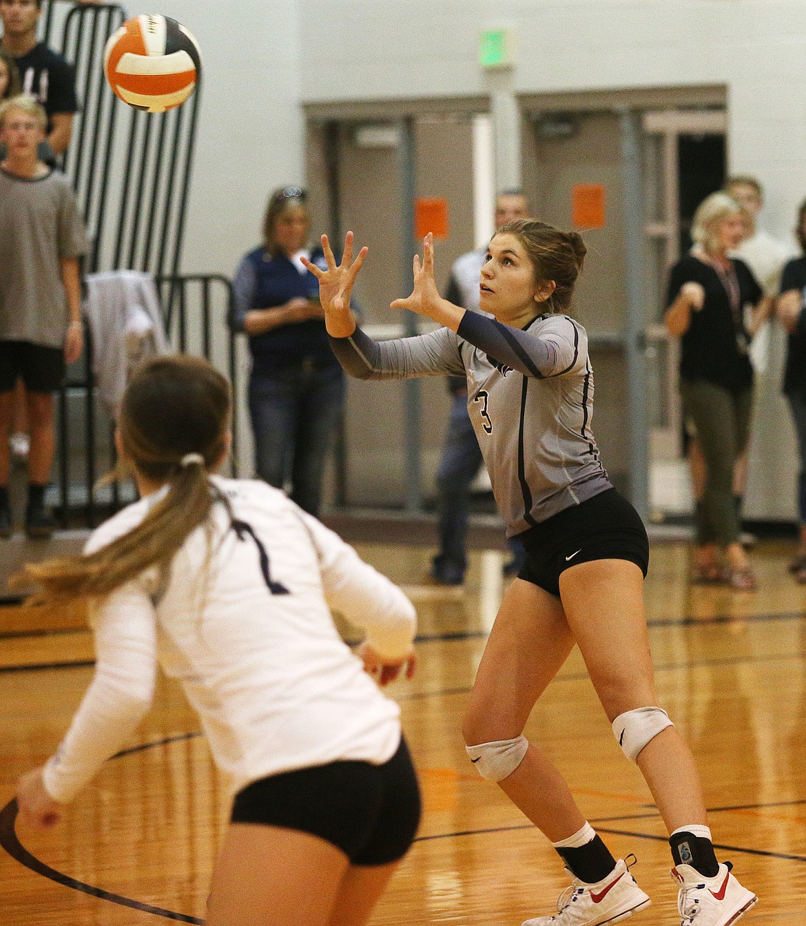 Lake City&#146;s Ashley Kaufman sets the ball to a teammate in a match against Post Falls.