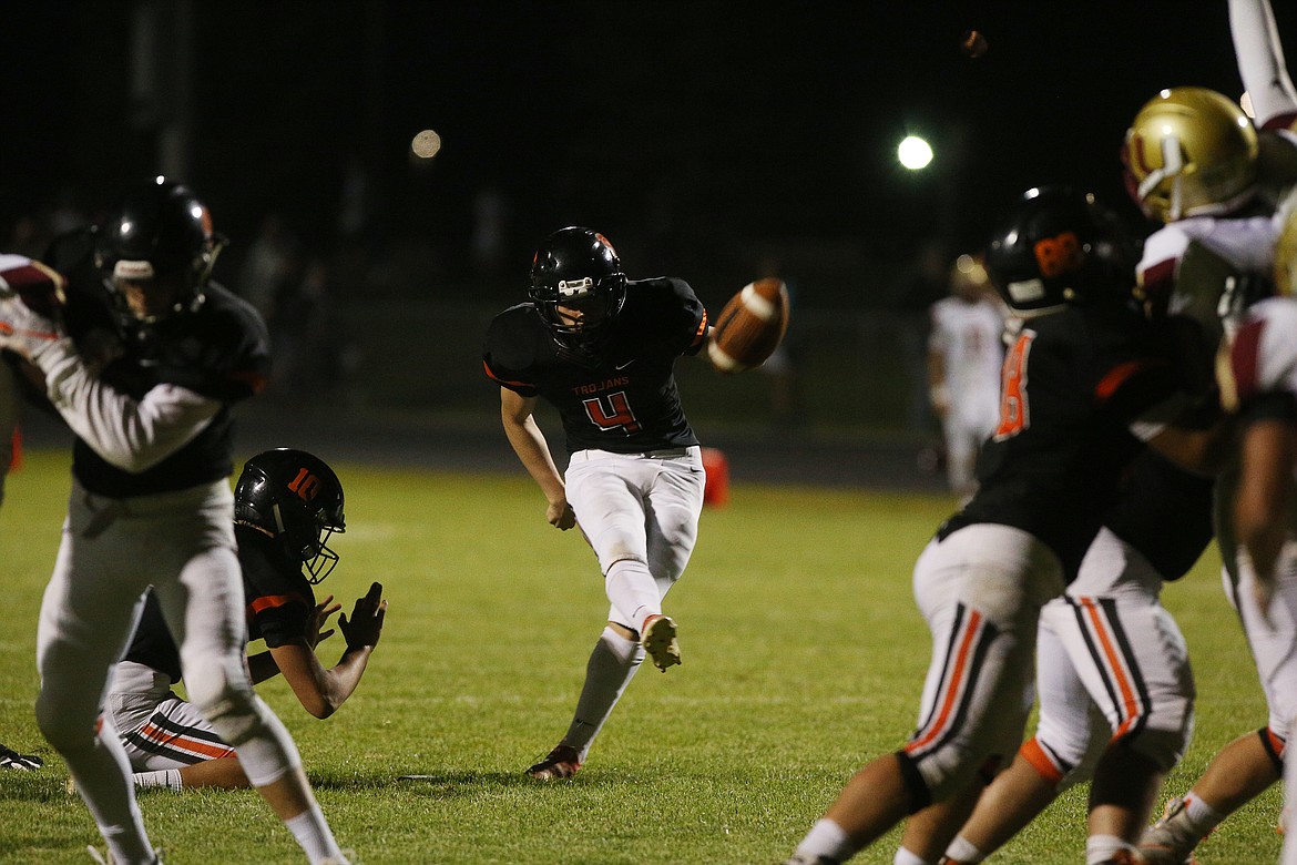 Grant Jones of Post Falls kicks an extra point in Friday night&#146;s game against University.