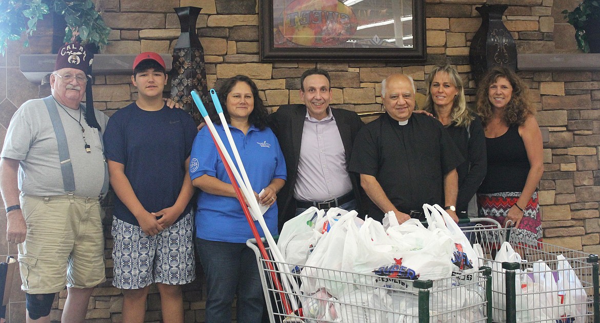 Photos by TANNA YEOUMANS
The winner of the Shriners raffle at the fair was Rafael Droz (center).