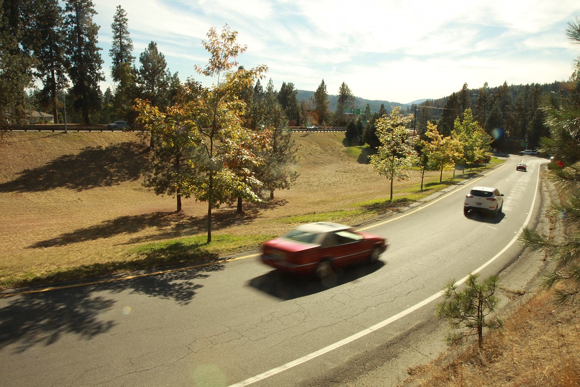 RALPH BARTHOLDT/Press
Traffic exiting U.S. 95 to Northwest Boulevard passes along a large, grass field the city is considering using to collect stormwater.