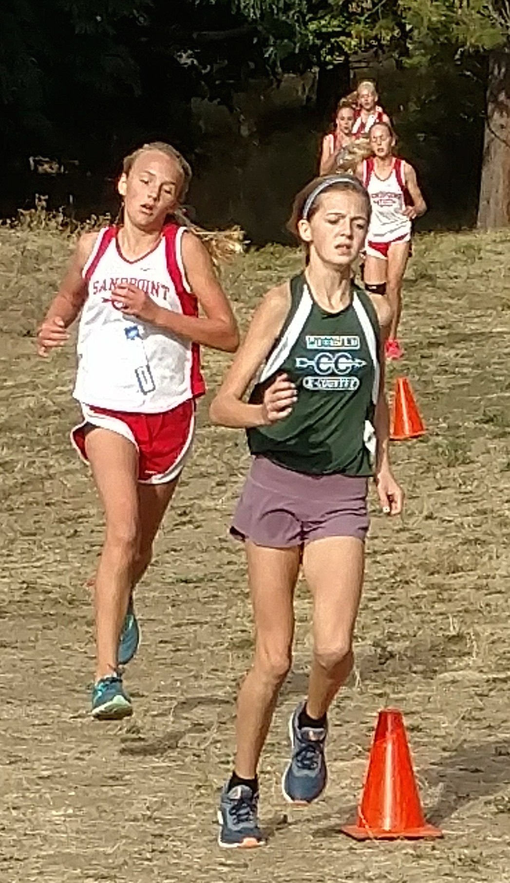 (Courtesy photo) 
Bullpop runner Ara Clark, left, finished fourth to lead the girls team at Cherry Hill Park in Coeur d&#146;Alene.