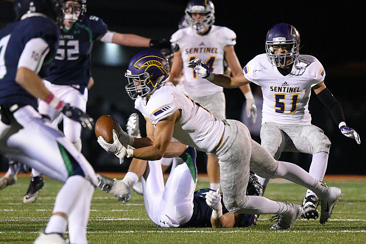 Missoula Sentinel defensive back Rylan Ortt (2) intercepts a third quarter pass by Glacier quarterback Evan Todd (2) at Legends Stadium on Friday. (Casey Kreider/Daily Inter Lake)