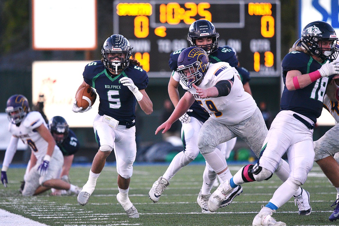 Glacier's Drew Deck (5) looks for running room on a first quarter kickoff return against Missoula Sentinel at Legends Stadium on Friday. (Casey Kreider/Daily Inter Lake)