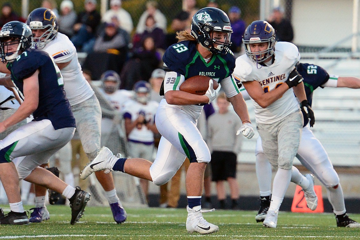 Glacier running back Preston Blain (33) heads to the end zone on a first quarter touchdown run against Missoula Sentinel at Legends Stadium on Friday. (Casey Kreider/Daily Inter Lake)