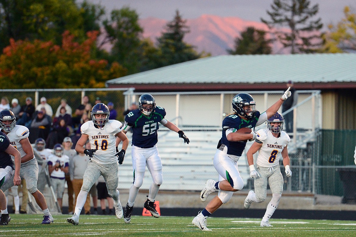 Glacier running back Preston Blain (33) heads to the end zone on a first quarter touchdown run against Missoula Sentinel at Legends Stadium on Friday. (Casey Kreider/Daily Inter Lake)