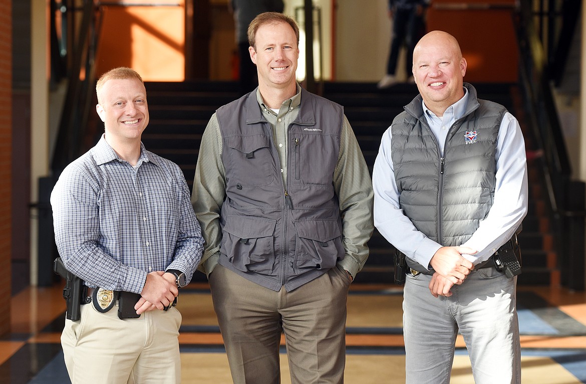 From left, Dennis Bain, the current school resource officer at Flathead High School, Wade Rademacher, the first SRO, and Cory Clarke, former SRO at Flathead and current team leader. There are also&#160;school resource officers at Glacier High School and Kalispell Middle School. (Brenda Ahearn/Daily Inter Lake)