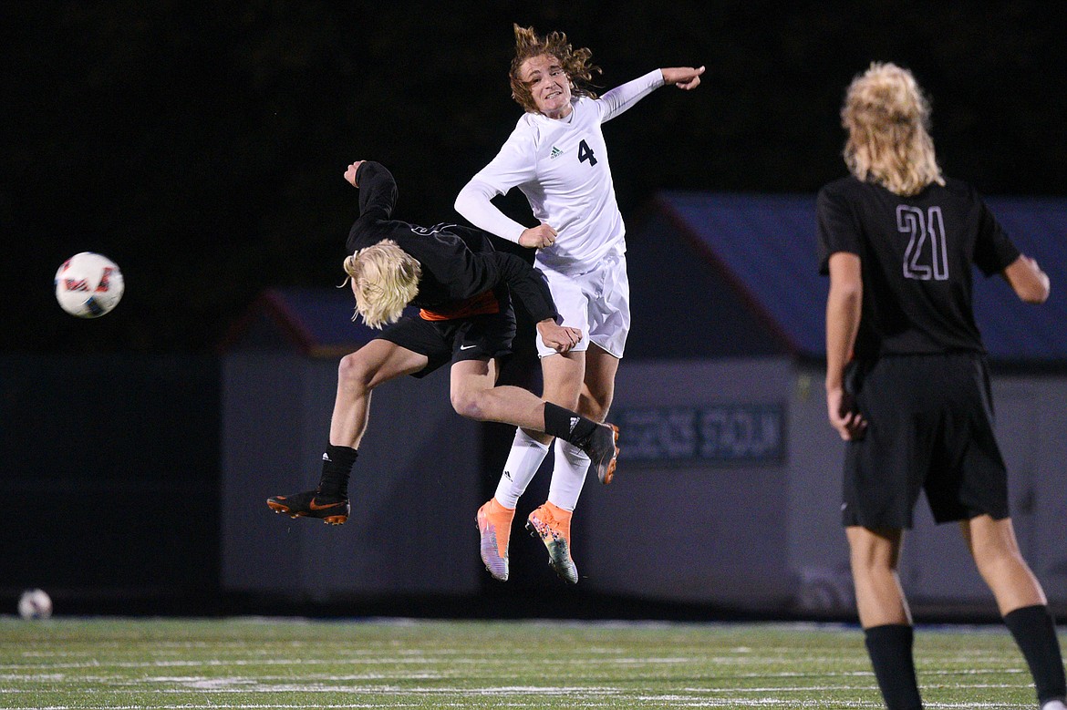 Flathead's Eric Gardner (6) and Glacier's Braden Nitschelm (4) compete for a header during a crosstown matchup at Legends Stadium on Thursday. (Casey Kreider/Daily Inter Lake)