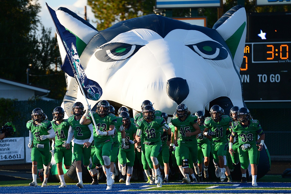 Glacier heads out onto the field for their matchup with Helena at Legends Stadium on Friday. (Casey Kreider/Daily Inter Lake)