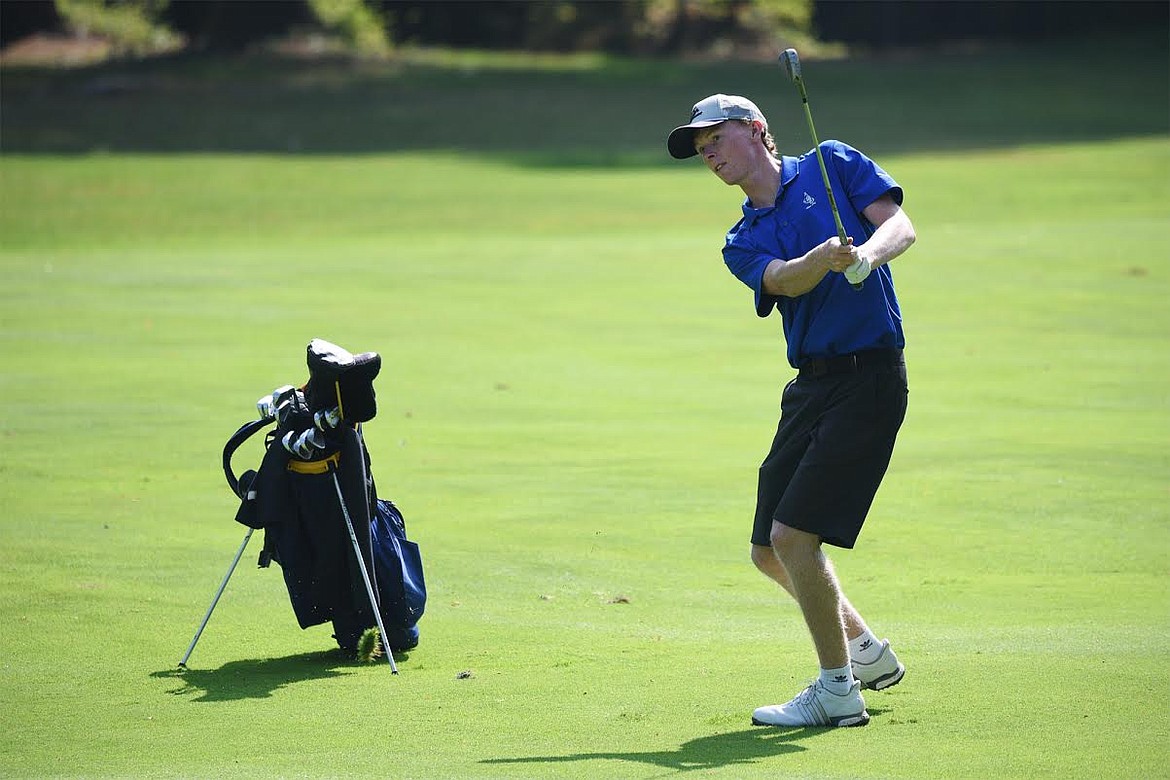 Libby's Ryggs Johnston watches his approach on the 12th hole of Whitefish Lake Golf Club's North Course during the Whitefish Invitational on Wednesday. (Casey Kreider/Daily Inter Lake)