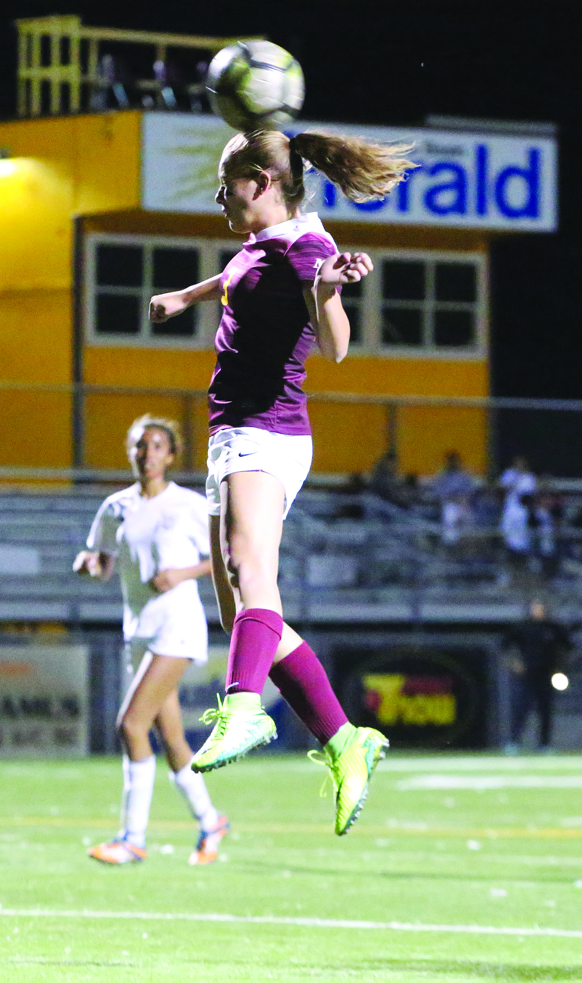 Connor Vanderweyst/Columbia Basin Herald
Moses Lake forward Natalie Bunch tries to put a head on the ball against Davis.