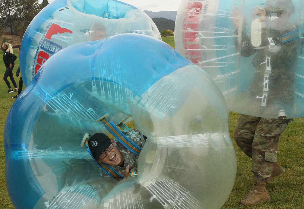 Youth Pathfinder Academy-North Idaho member Tim Hess, 16, of Post Falls, gets smashed in a &#147;battle ball&#148; Saturday morning during the Idaho Army National Guard&#146;s second Coeur d&#146;Alene Warrior Challenge in McEuen Park. &#147;You get to run into people as hard as you can and knock them over,&#148; Tim said.