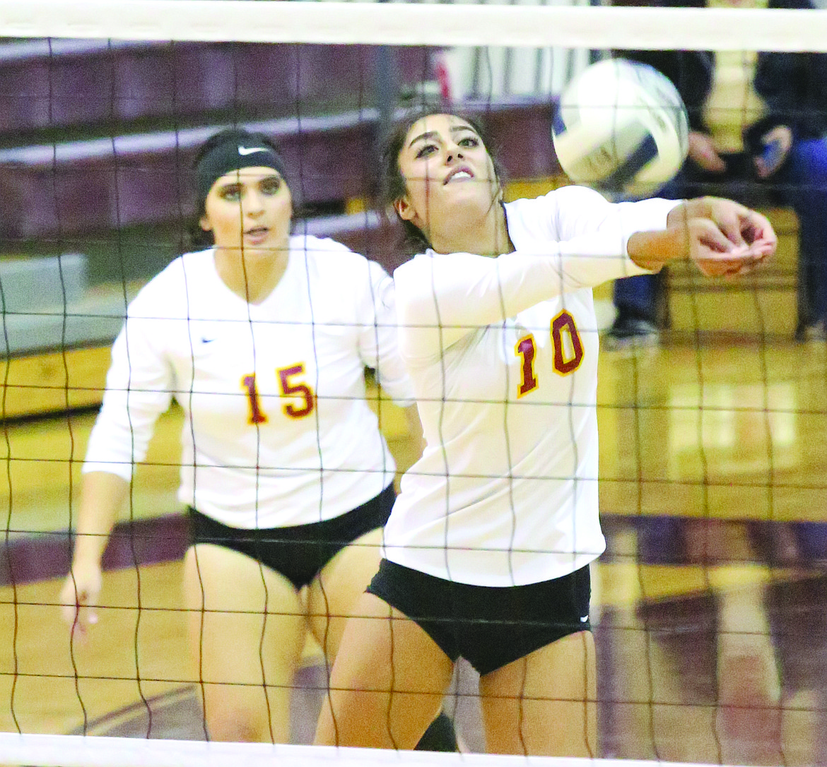 Connor Vanderweyst/Columbia Basin Herald
Moses Lake senior Yasmin Shateri (10) connects on a bump against Eisenhower. Shateri finished with a team-high 13 kills.