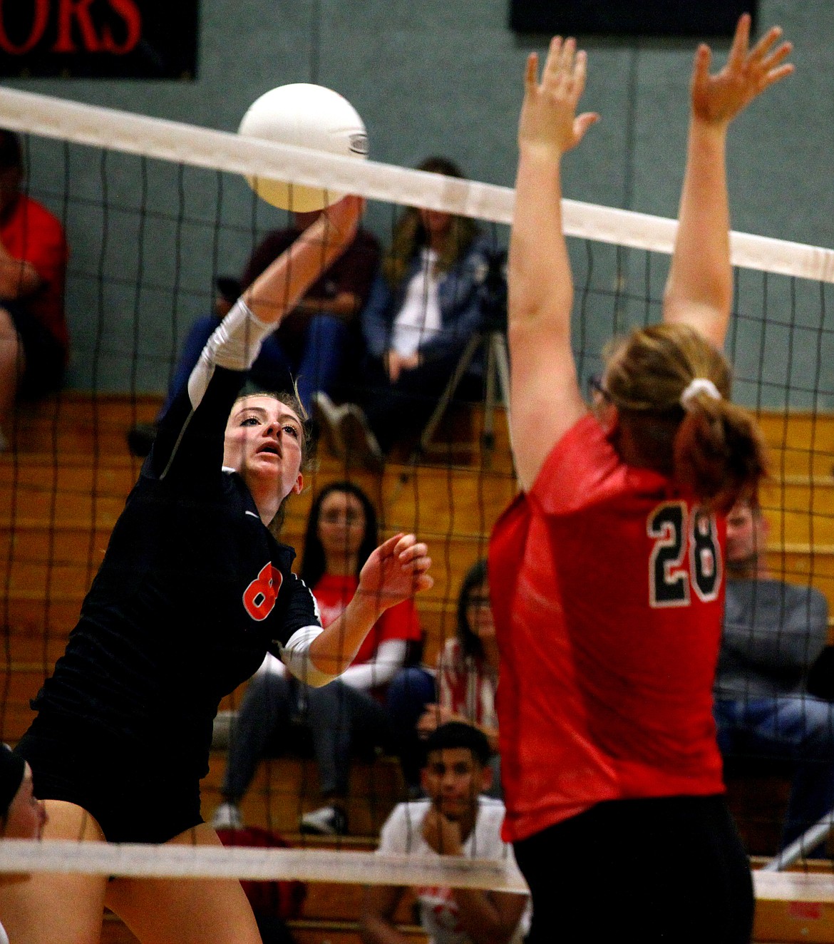 Rodney Harwood/Columbia Basin HeraldEphrata outside hitter Laura Davis (8) hits past the block of Othello middle blocker Taylor Taff during the first set of Tuesday night's CWAC match in The Jungle.