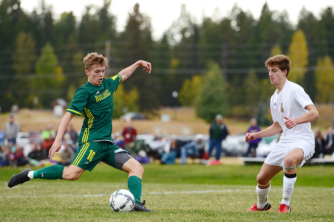 Whitefish's Casey Schneider (10) scores a first half goal past Polson defender Davis Smith (4) at Smith Fields in Whitefish on Saturday. (Casey Kreider/Daily Inter Lake)