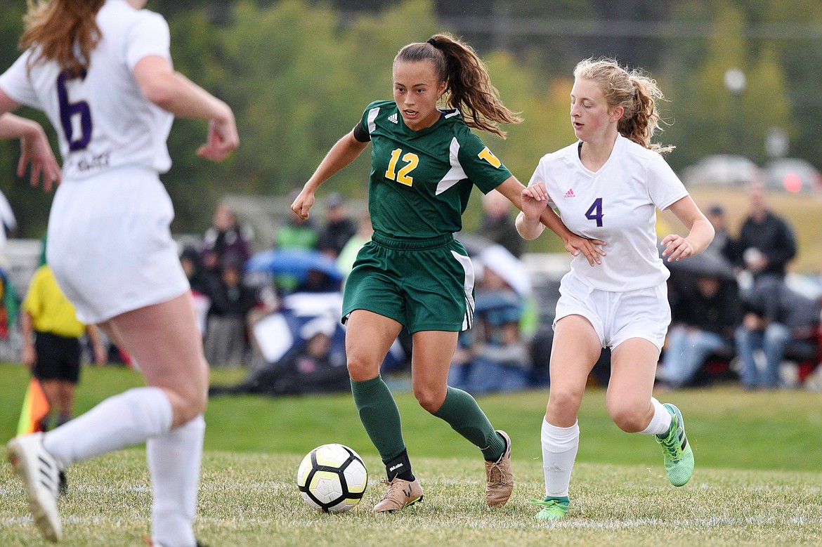 Whitefish's Anna Cook works the ball upfield against Polson at Smith Fields in Whitefish on Saturday. (Casey Kreider/Daily Inter Lake)