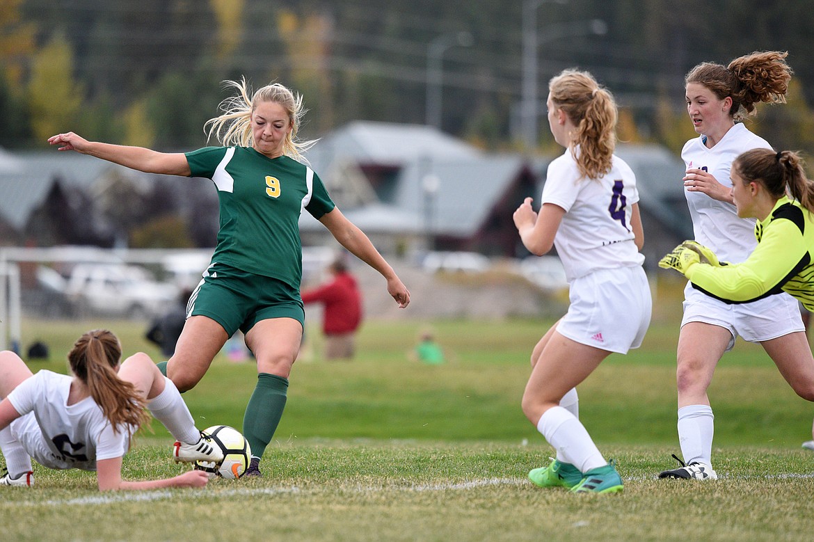 Whitefish's Saylor Schlauch scores a goal in the first half against Polson at Smith Fields in Whitefish on Saturday. (Casey Kreider/Daily Inter Lake)