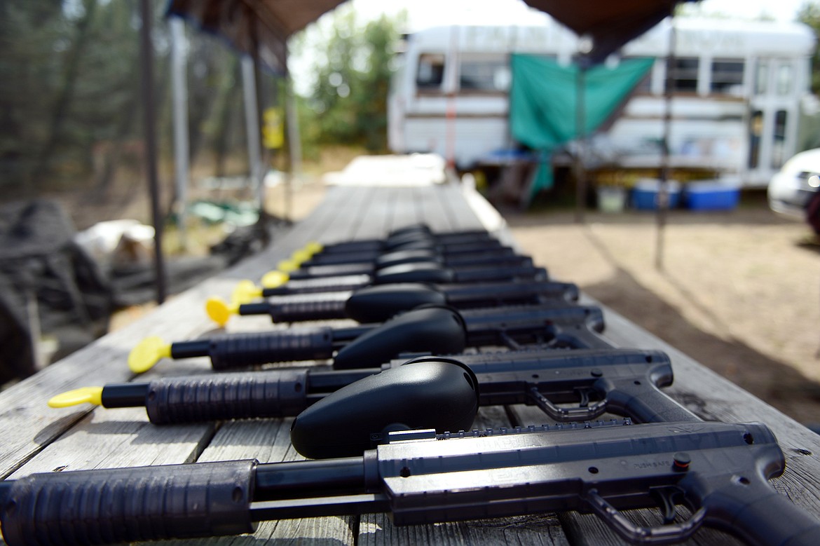 Pump-action, low-impact paintball guns on display outside Montana Action Paintball. Owner Nick Lynn offers rental of both regular paintball guns and these low-impact models, which will be used around Halloween when Lynn opens a course that will feature zombies.