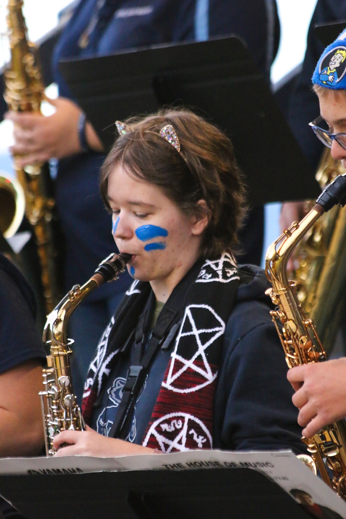 School pride was evident throughout the band members as they played and cheered on the football team.