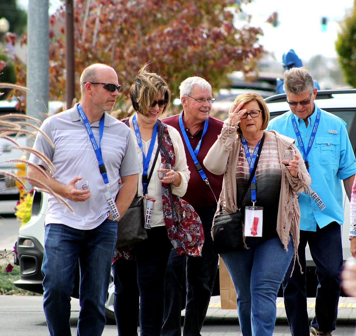 Richard Byrd/Columbia Basin Herald
Participants in the Sip &amp; Stroll event on Saturday take off through downtown Moses Lake.