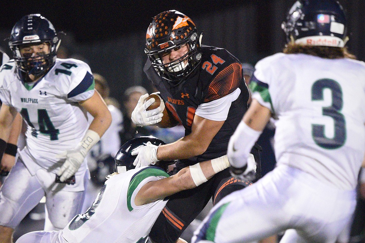 Flathead running back Blake Counts (24) looks for running room against the Glacier defense at Legends Stadium on Friday. (Casey Kreider/Daily Inter Lake)