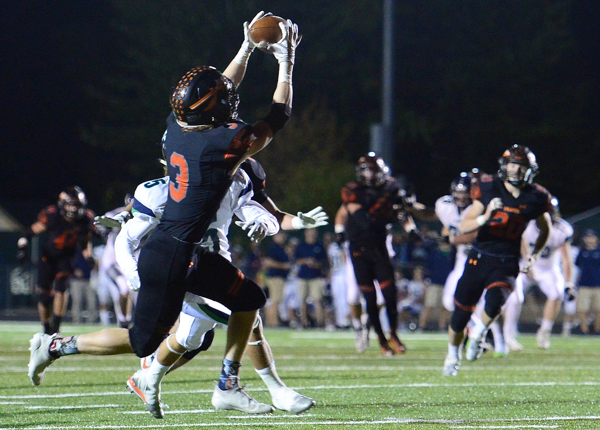 Flathead defensive back Chance Sheldon-Allen intercepts a third quarter pass by Glacier quarterback Evan Todd at Legends Stadium on Friday. (Casey Kreider/Daily Inter Lake)