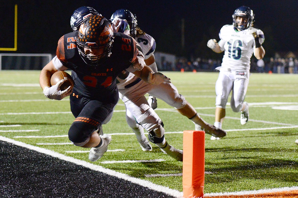 Flathead running back Blake Counts (24) dives for the end zone in the fourth quarter against Glacier at Legends Stadium on Friday. (Casey Kreider/Daily Inter Lake)