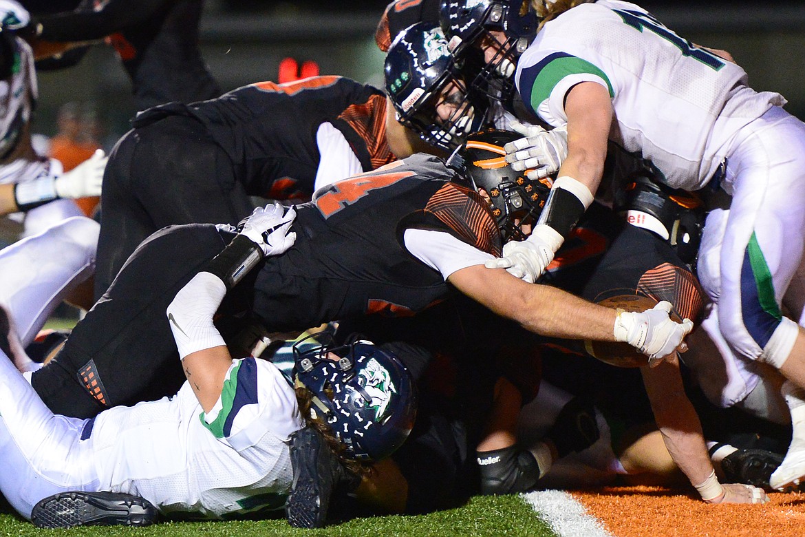 Flathead running back Blake Counts (24) reaches for a fourth quarter touchdown against Glacier at Legends Stadium on Friday. (Casey Kreider/Daily Inter Lake)