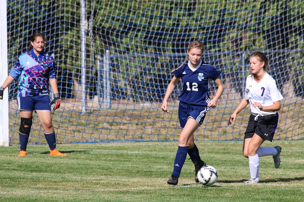 Photo by MANDI BATEMAN
Sophomore Emma Pinkerton defending the Badger's goal.