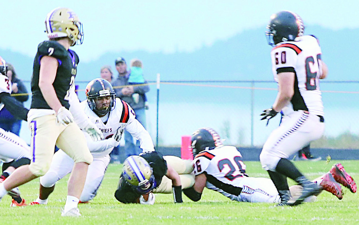 Ronan&#146;s Daniel Bishop tackles a Polson ballcarrier during the Pirates-Chiefs game Friday night at Polson High School. (Photo courtesy of Susan Lake/Lake Photography)