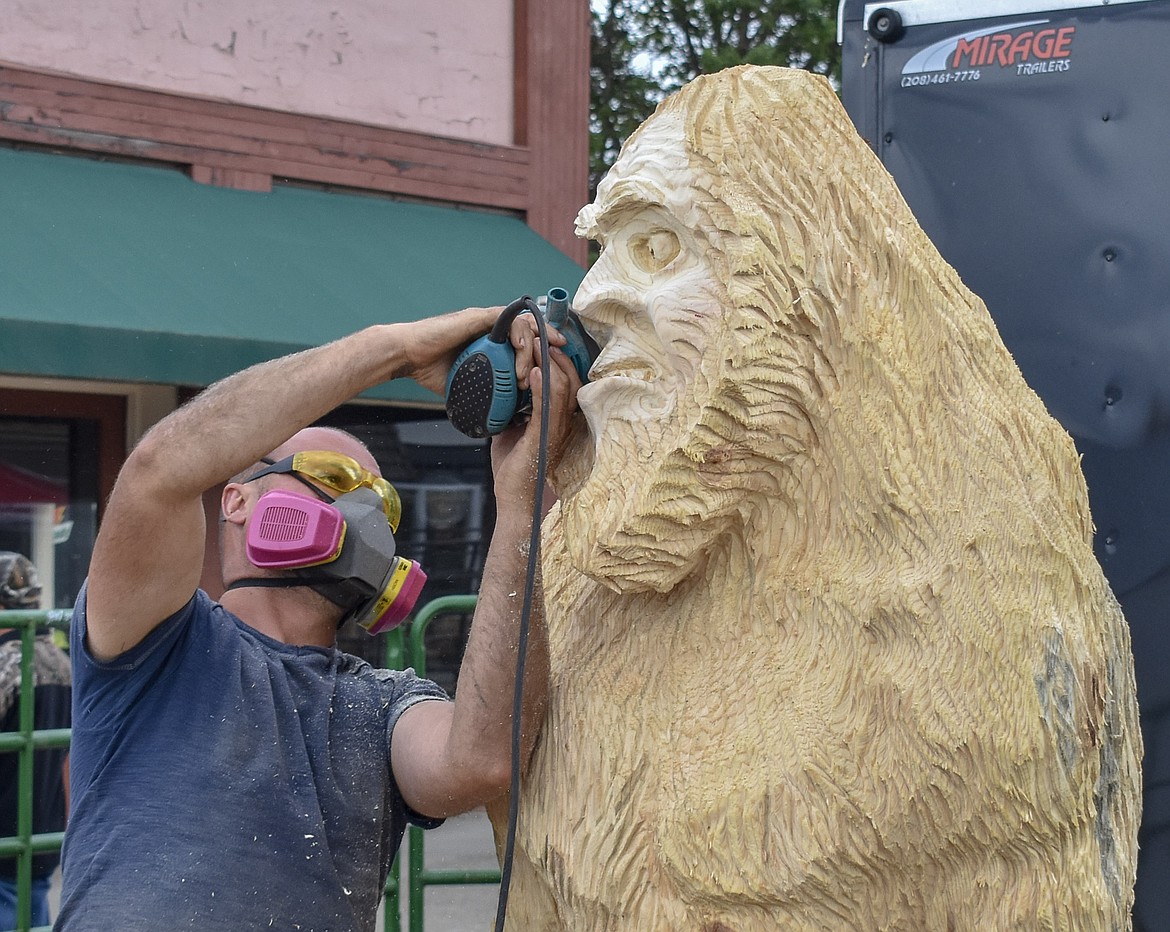 Alex Pricob -- originally from Moldova and currently living in Seattle -- works on his piece during the Kootenai Country Montana Chainsaw Carving Championship on Saturday. (Ben Kibbey/The Western News)