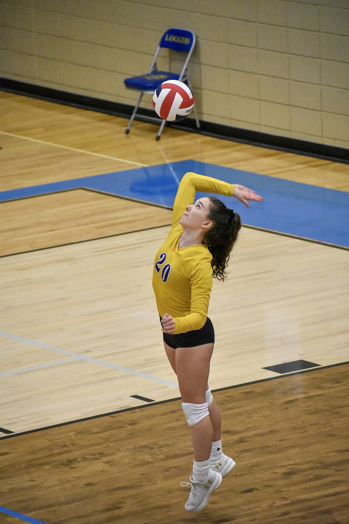 Libby senior Emma Gruber serves during the Lady Loggers&#146; three-set win against Ronan Saturday. Gruber was one of four Libby players with 100 percent serving. (Ben Kibbey/The Western News)