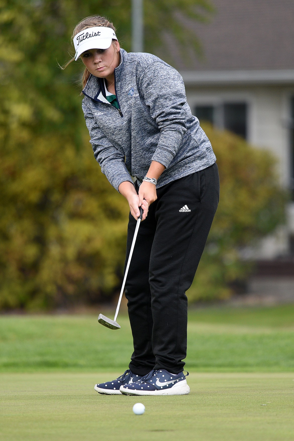 Glacier's Kate Trunkle putts on the first green during the Crosstown Cup at Village Greens Golf Club on Thursday. (Casey Kreider/Daily Inter Lake)