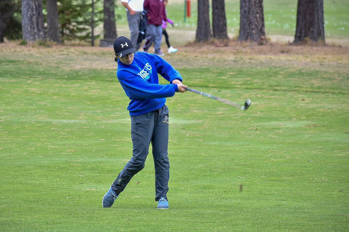 Libby sophomore Kayley Svendsbye drives on the 9th hole during the Western &#145;A&#146; Divisional at Cabinet View Golf Club in Libby Friday. (Ben Kibbey/The Western News)