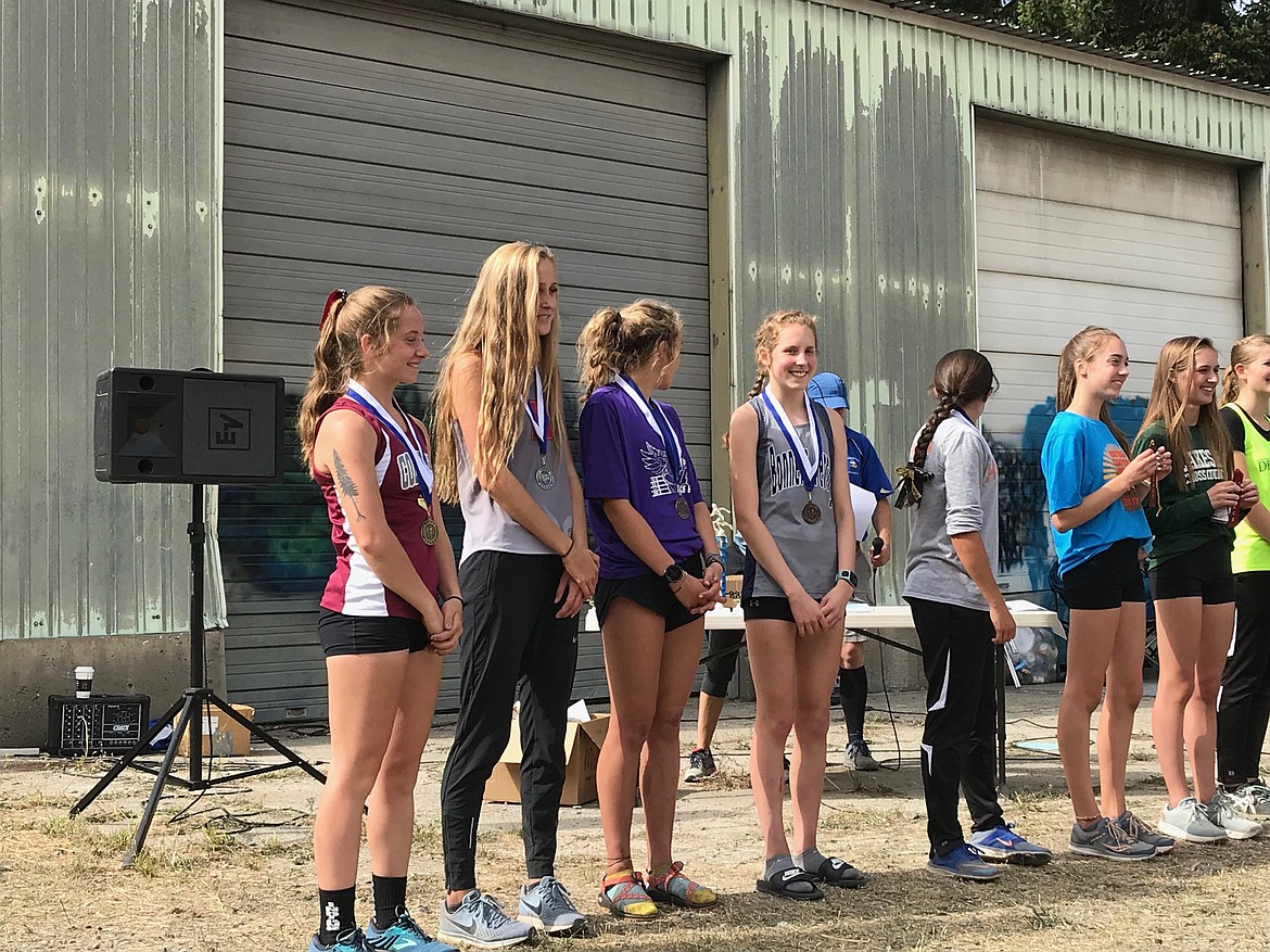 Photo by TYLER WARNER
Abby Gorton receiving a medal.